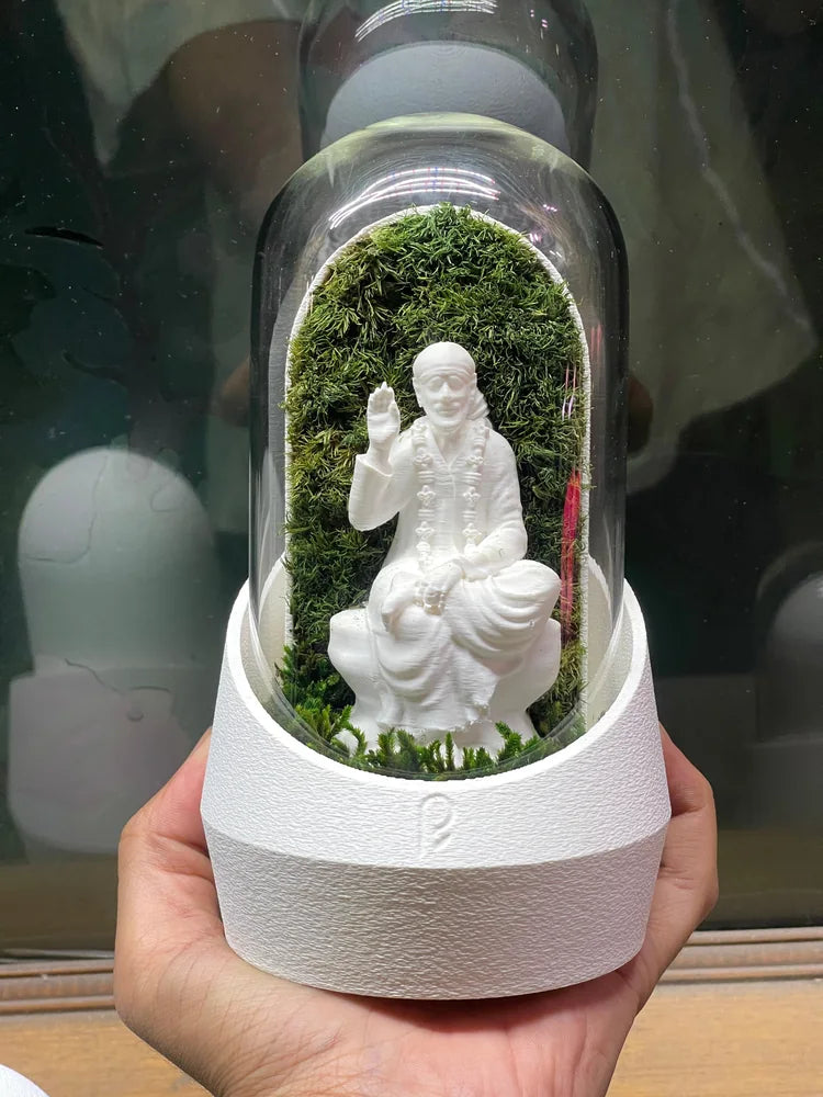 Customer holding a white figurine dome